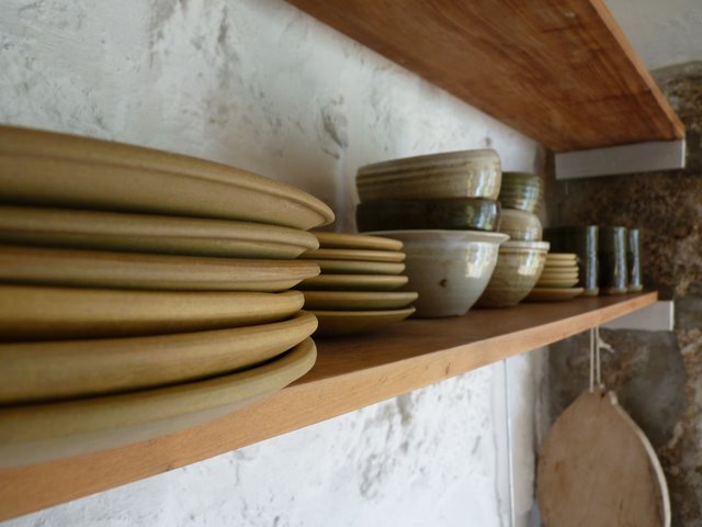 Earthenware crockery in the cottage's kitchen